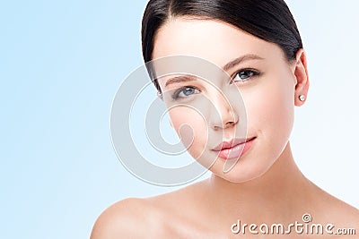 Ð¡loseup the face of a beautiful young woman. Perfect beauty portrait Stock Photo